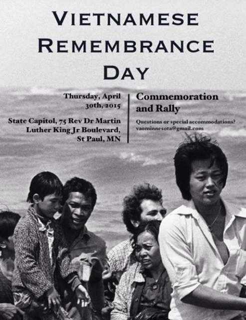 In a black-and-white photograph below black text, six people sit in what appears to be a boat, with water and sky in the background.